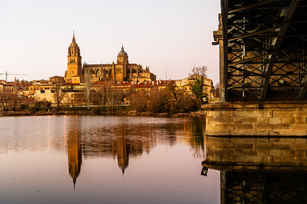 Scenic view of Salamanca with the Cathedral and iron bridge reflected in the To, an Architecture Photo by Architect´s eye