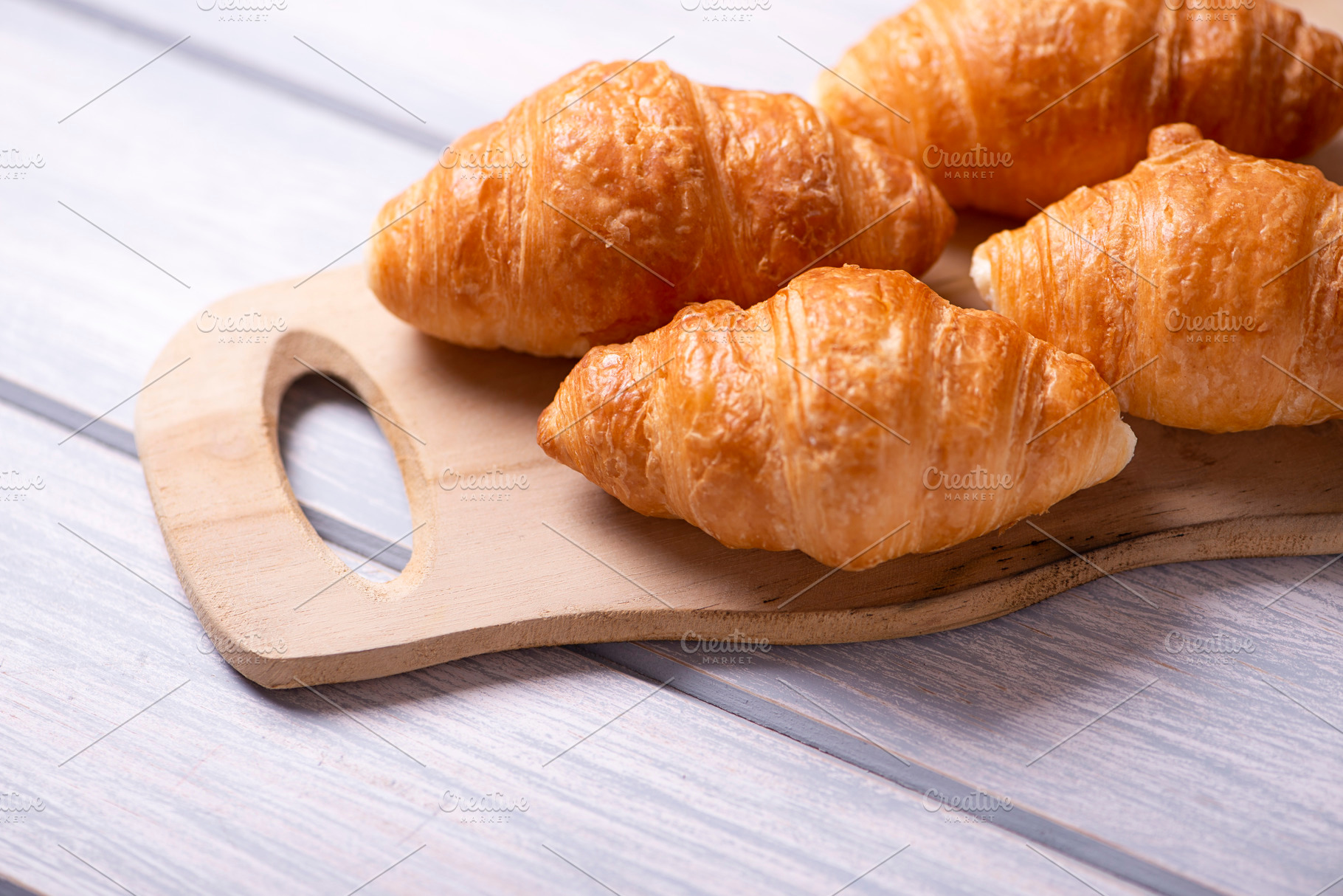 Close-up of croissants prepared for, a Food & Drink Photo by José Luis Agudo