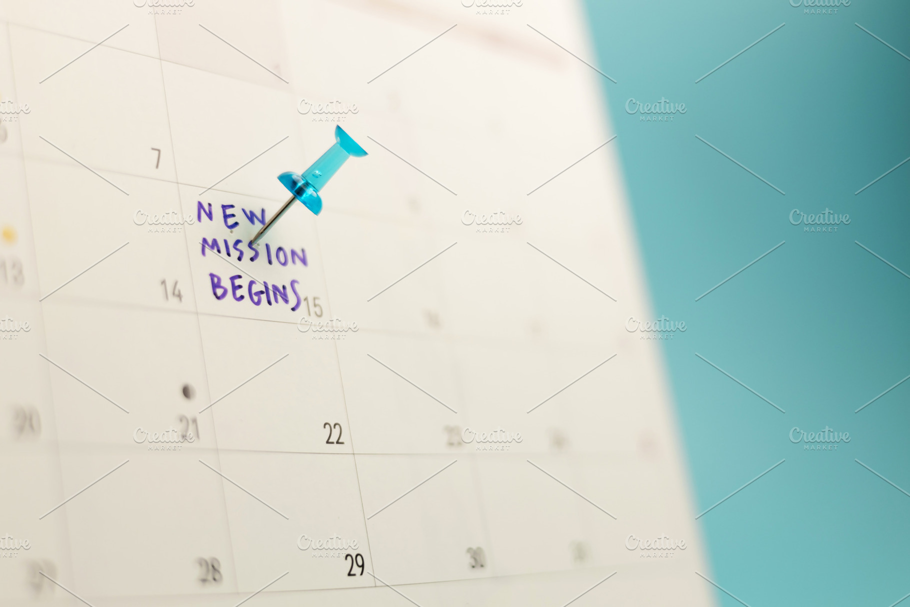 Calendar with note saying “New Mission Begins” representing, a Photo by salmon.black