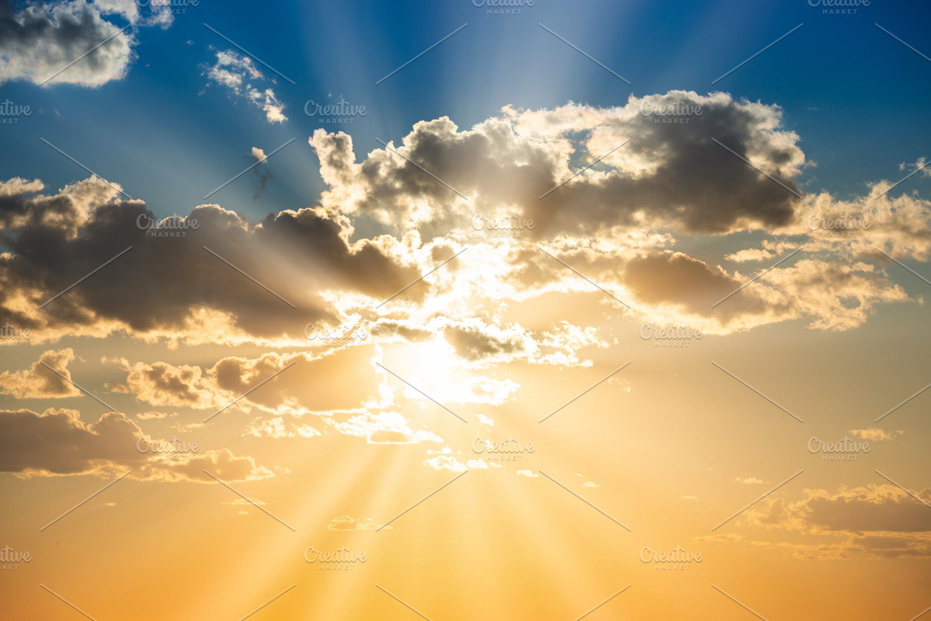 Sunset sky with clouds and sun, a Photo by Vapi