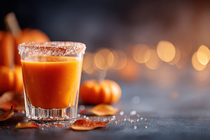 Pumpkin juice in a cozy autumn setting, a Food & Drink Photo by AlyaAnd