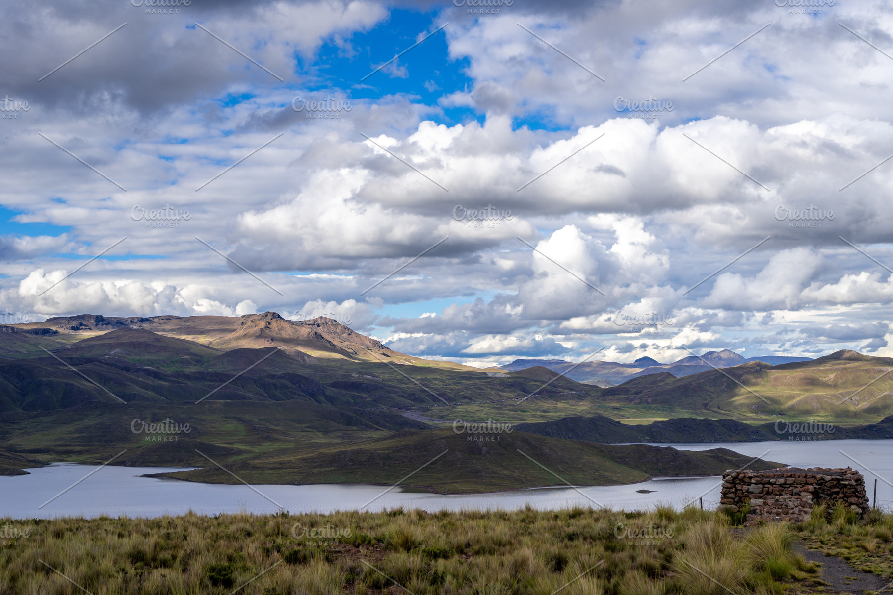 Storm clouds over Lake Lagunillas in the Peruvian highlands, a Nature Photo by GoodGoods