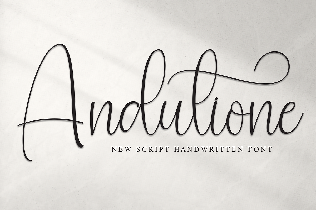 Andutione | Script Font, a Handwritten Font by Scratchones (Photo 1 of 9)