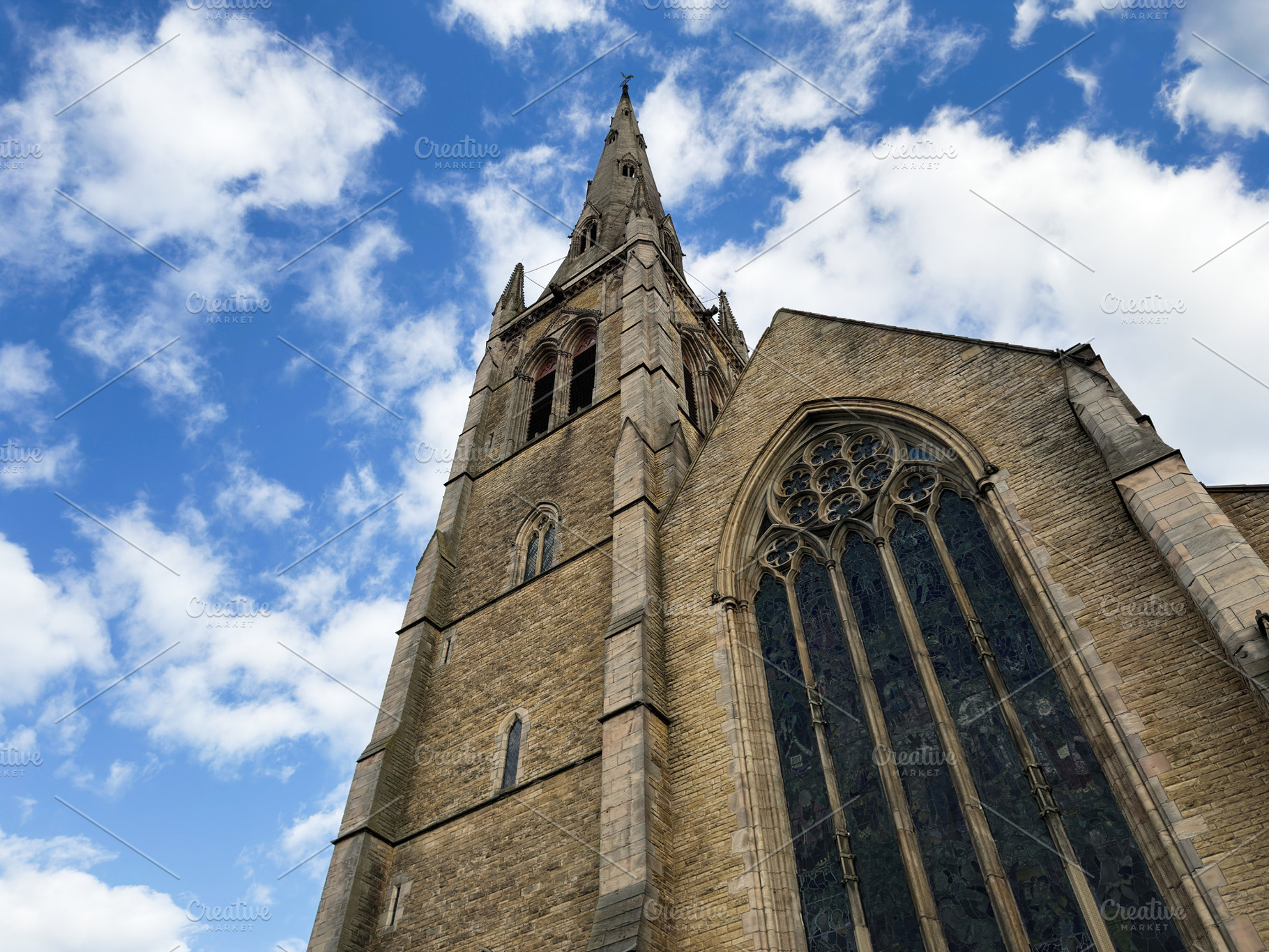 Historic Gothic St Mary, Hulme church with soaring spire and orn, a Photo by AS photostudio