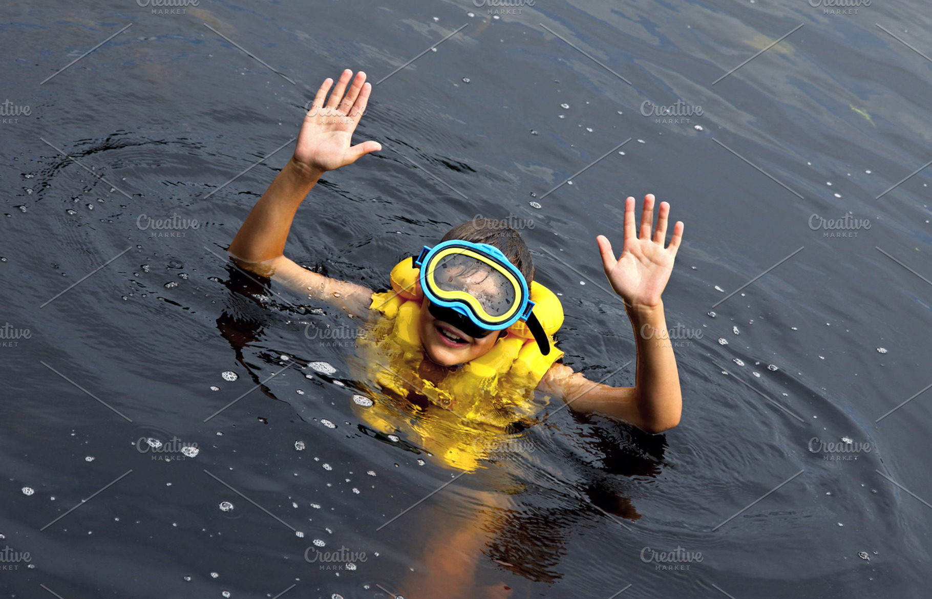Young boy swimming, a Person Photo by BOOCYS