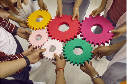 Creative young people hold colored, a Business Photo by StudioRomantic