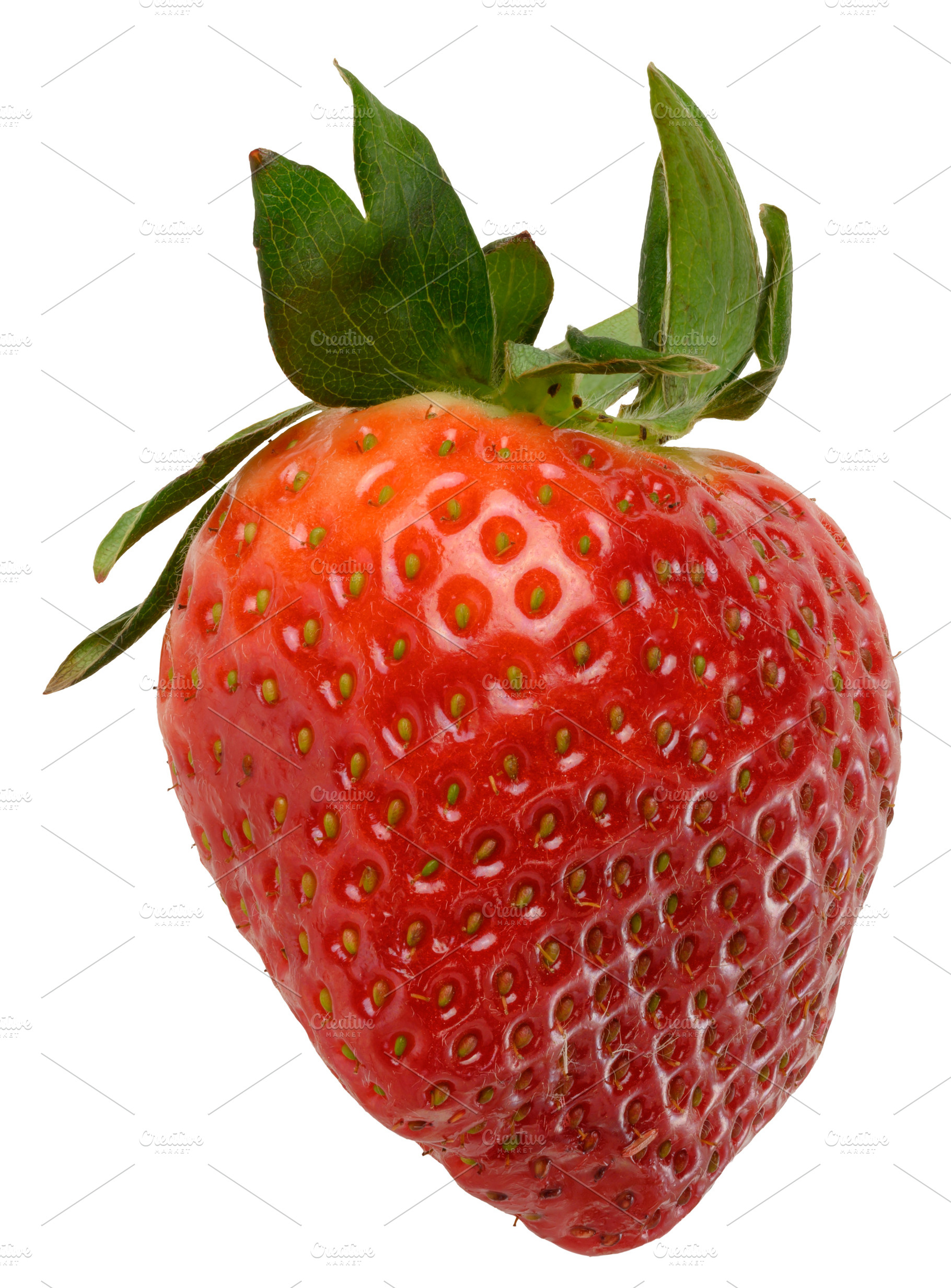 Large ripe strawberry berry with green sepals and leaves, a Food & Drink Photo by ndanko