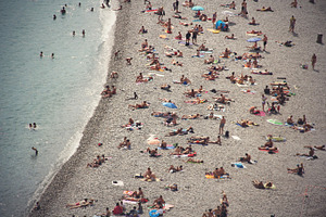 People on the beach containing people, beach, and travelling