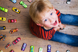 Boy with toy cars stock photo containing kid and birthday
