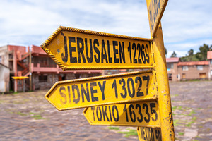 World capitals distance sign on Taquile Island, Lake Titicaca, P, a Photo by GoodGoods
