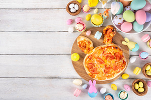 Cute Easter pizza with bunny ears and in form of Easter eggs, a Food & Drink Photo by Rimma