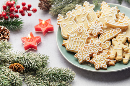 Christmas cookies decorated with icing celebrating christmas eve, a Holiday Photo by Olena Rudo