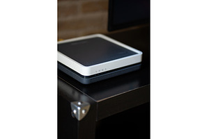 Modern internet router or modem, a Technology Photo by volodymyrshtun13795