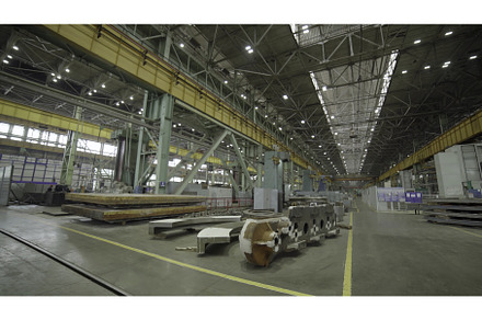 A large interior of a spacious, an Industrial Photo by Media Whale Stock