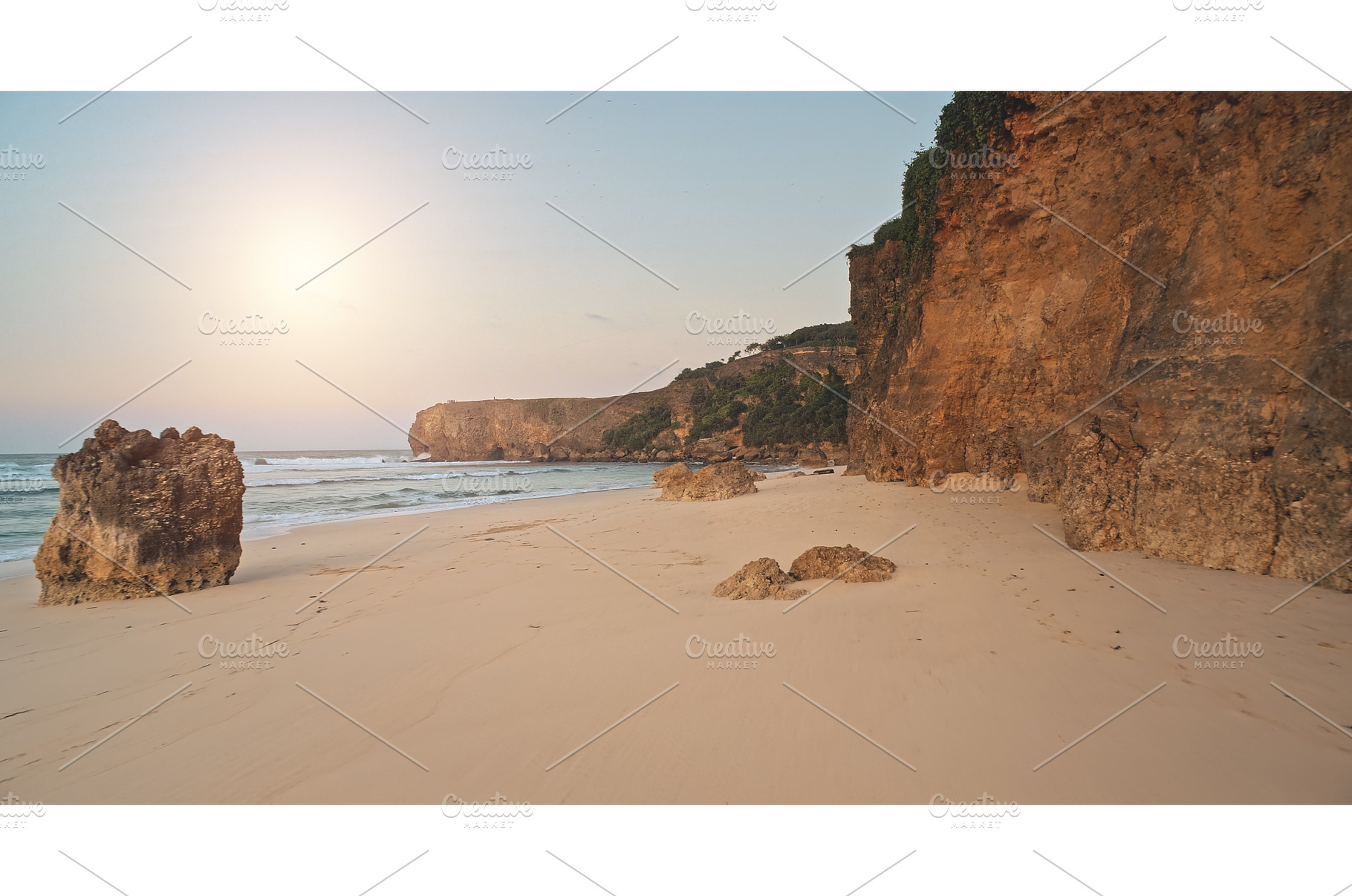 Sun light above sand beach at clean, a Nature Photo by Goinyk
