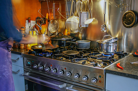 Cooking at home containing man, cooking, and home