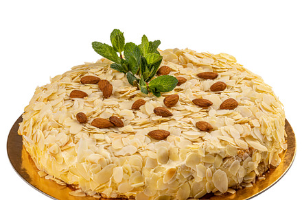 Whole round delicious almond cake, a Background Photo by Grafvision photography