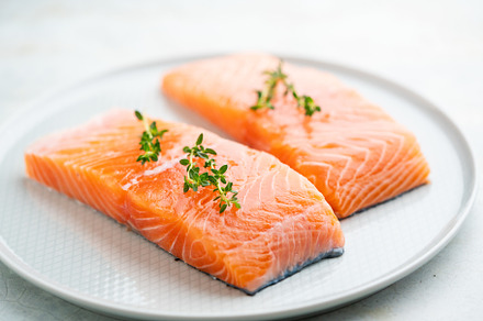 Fresh salmon fillet on a plate for delicious salmon steak.