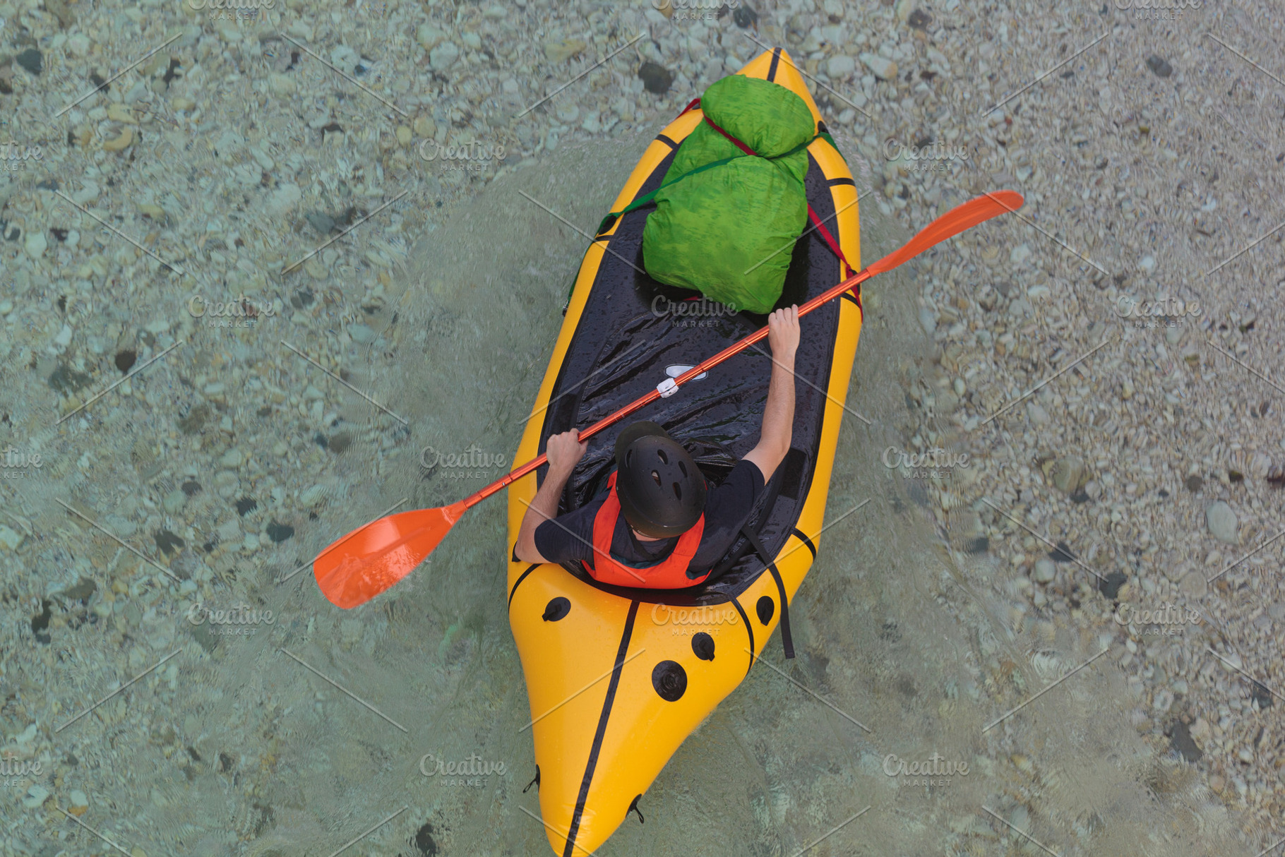 Kayaking Down the River. Caucasian Men in yellow Kayak. Soca river, Bovec, Slov, a Sports & Recreation Photo by Bepslabor