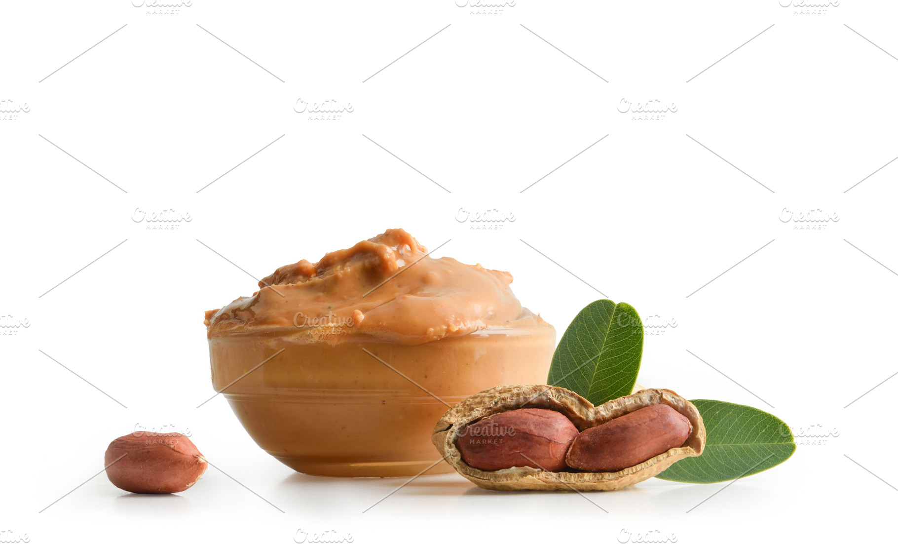 Peanut butter in a glass bowl isolated on white background, a Food & Drink Photo by Davizro's Market