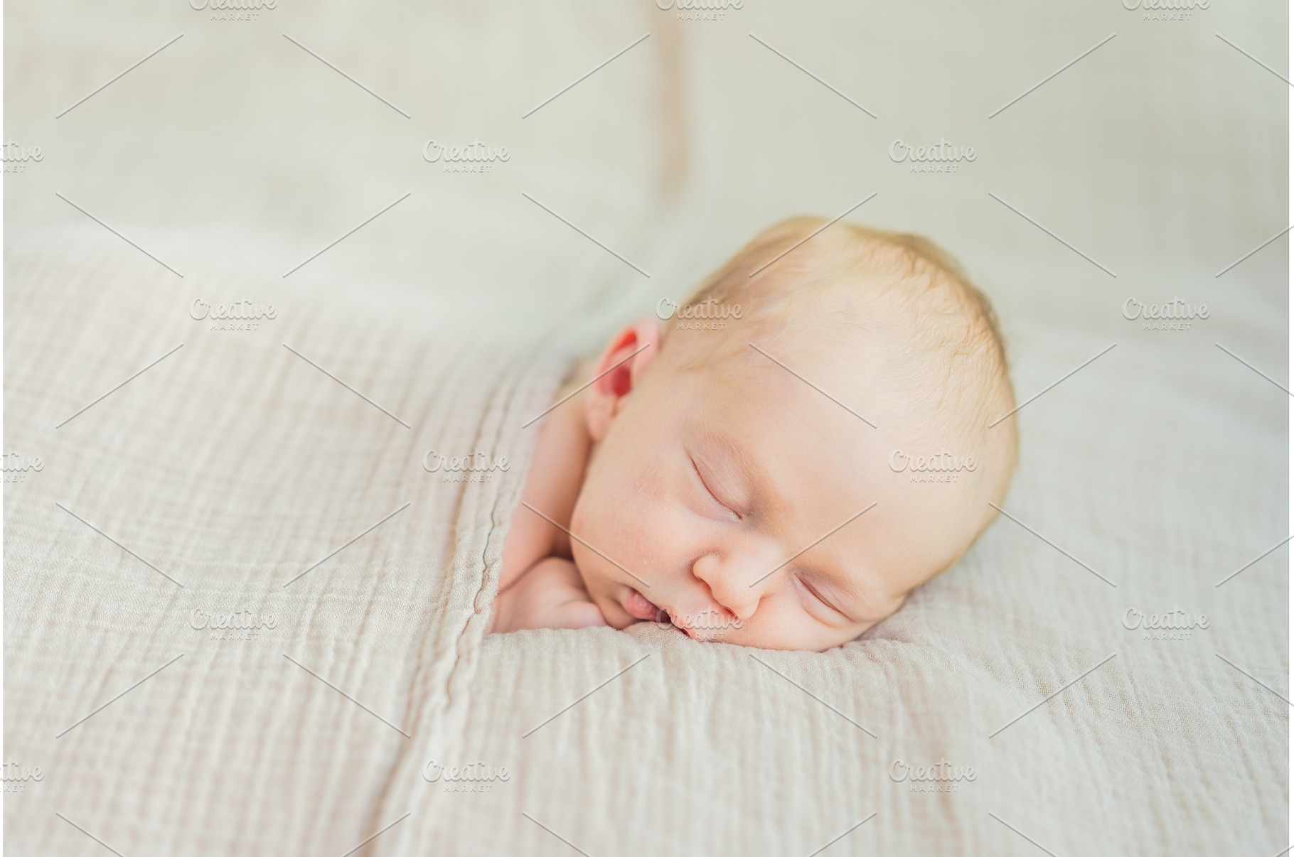The baby is sleeping peacefully in, a Person Photo by Elizaveta Galitskaya