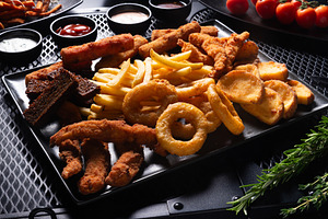 Assorted Deep Fried Snacks on Large Plate, Top View, a Photo by MDBildes