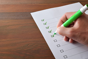 Hand Marking Checklist on Paper Form, a Business Photo by Davizro's Market