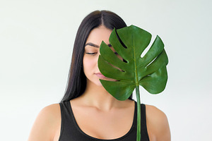 Organic beauty care eco cosmetic girl green leaf, a Person Photo by Photo Drive Studio