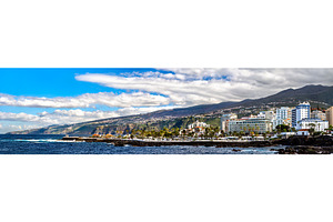 Panorama of Puerto de la Cruz coastline in Tenerife Spain, an Architecture Photo by Leonid Andronov
