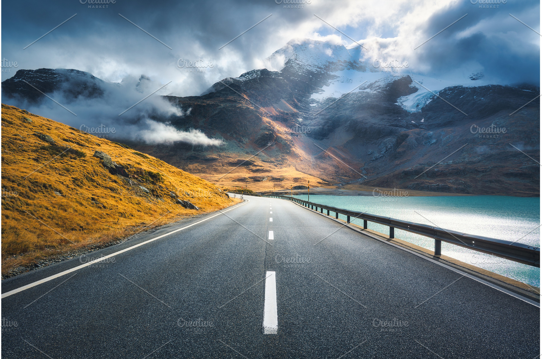 Empty road near lake in swiss snowy, a Transportation Photo by den-belitsky