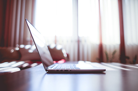 Macbook Pro In A Desk Stock Photograph preview 4