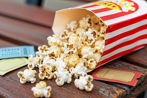 Popcorn Spilling from Striped Box, a Photo by rarrarorro