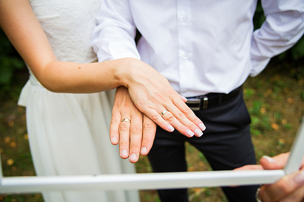 Newly wed couple's hands with wedding rings, a Person Photo by Artsaba Family