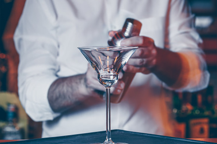 Barman pouring  cocktail at a nightc, a Food & Drink Photo by Kate Molchanova