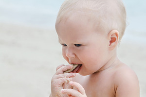 Baby on the beach, a Photo by saiko3p