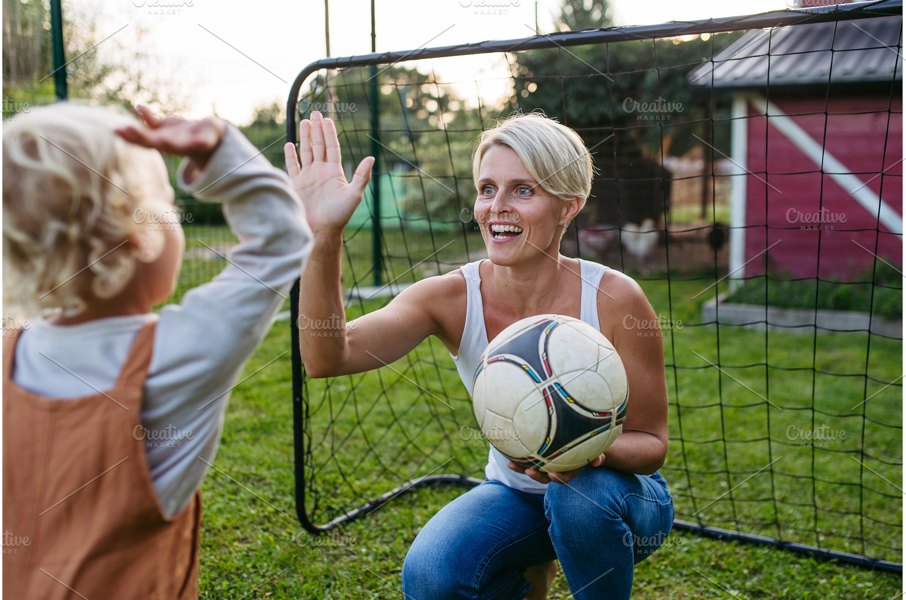 Little boy playing with ball with, a Sports & Recreation Photo by HalfPoint