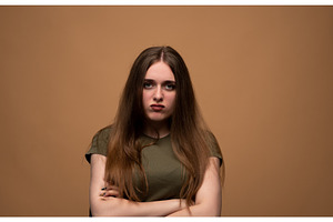 Young woman having an angry mood, a Person Photo by volodymyrshtun13795