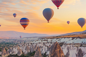 Hot air balloons over mountain, a Photo by MistyDay