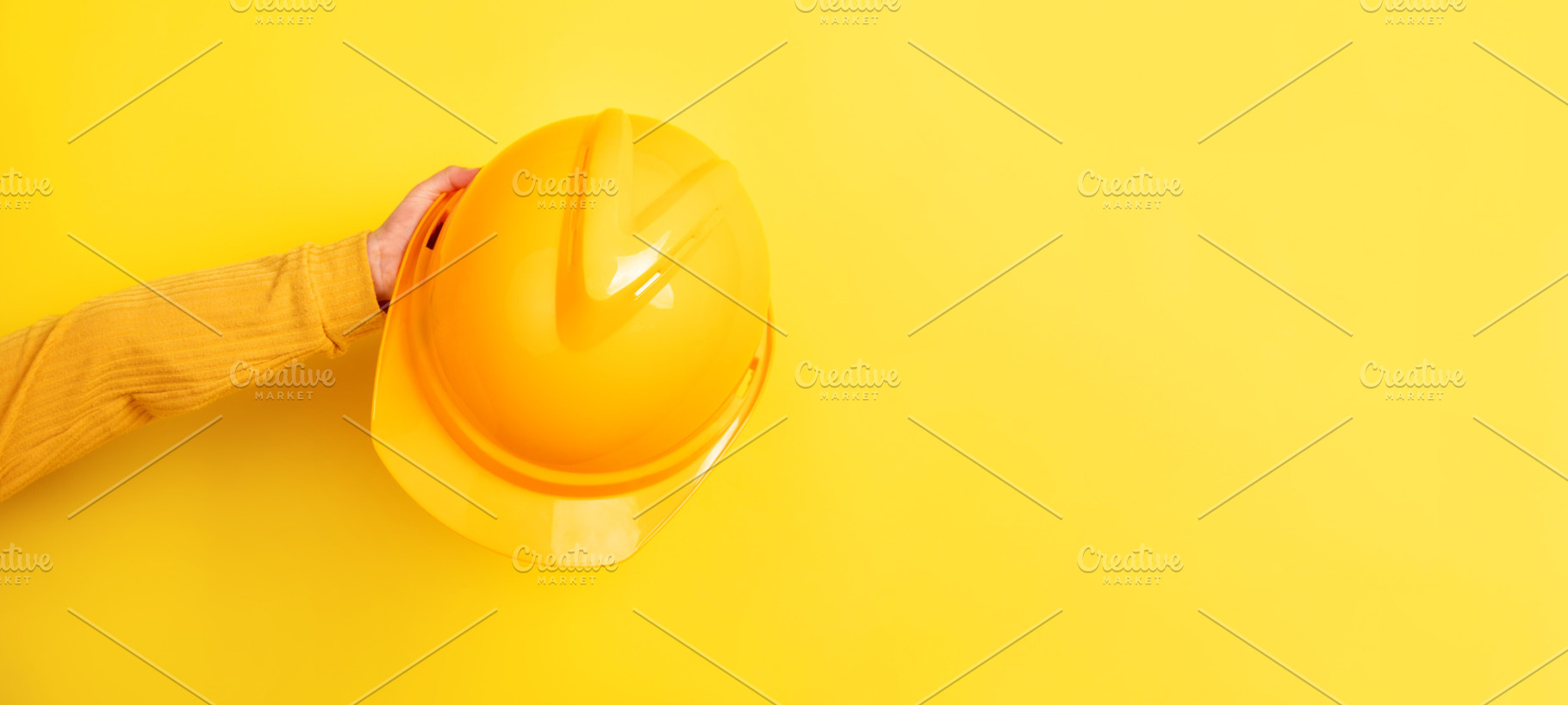 Yellow Safety Helmet on Yellow Background, an Industrial Photo by Ales Munt