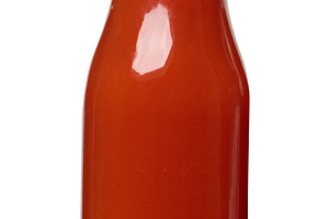 Glass bottles with tomato juice with red caps., a Food & Drink Photo by ndanko