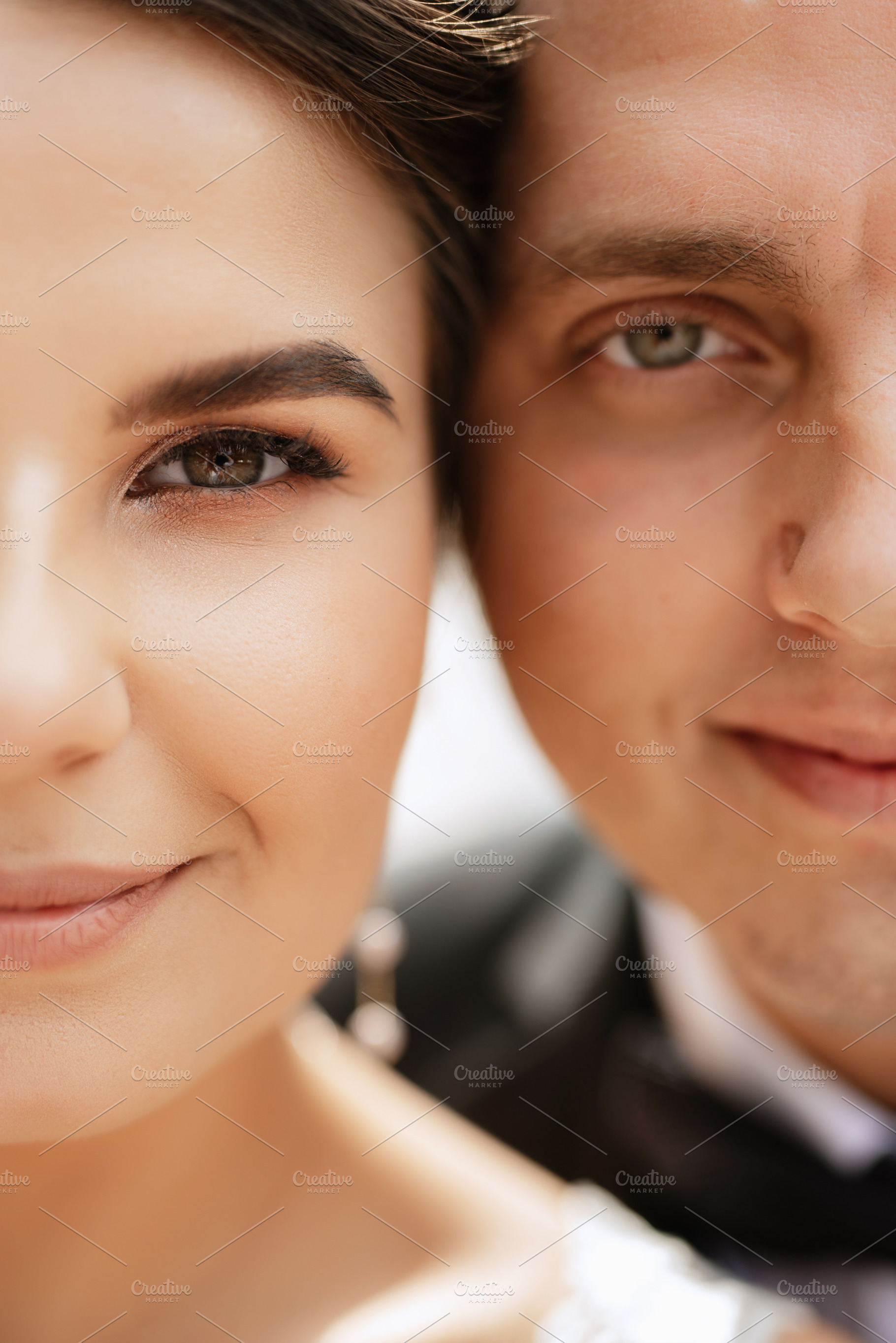 the groom in a brown suit and the bride in a white dress, a Person Photo by Weddings, People, Travel