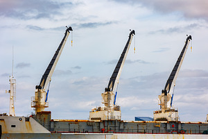 Industrial Cranes on a Rusty Merchan, an Industrial Photo by Perpis