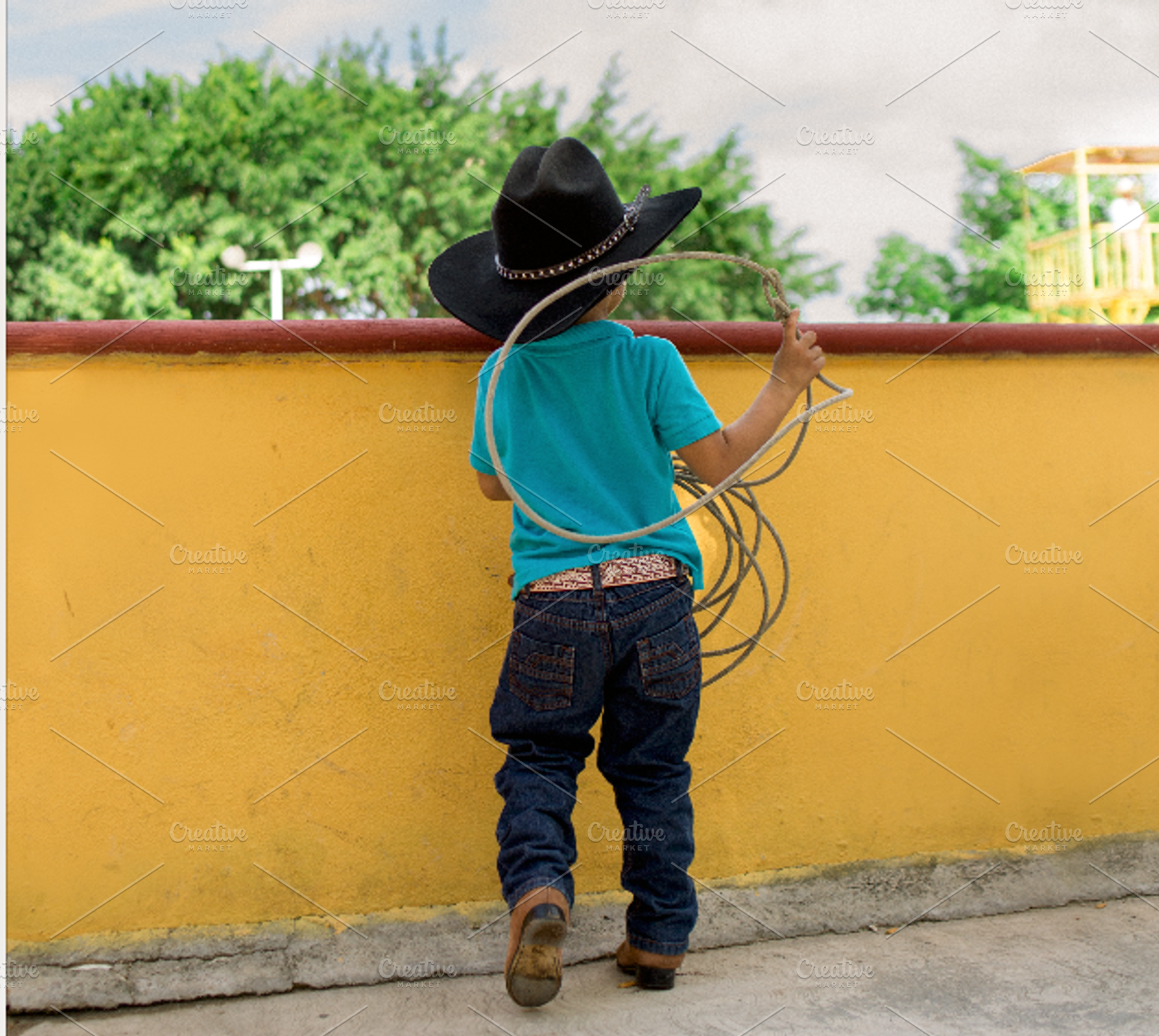 young mexican cowboy with lasso, a Person Photo by art.podolski