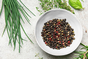 Fresh herbs and peppercorns creating culinary masterpiece on kit, a Food & Drink Photo by Olena Rudo