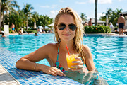 Blonde Girl in Summer Pool, a Holiday Photo by nandinigraphics (Thumbnail 1 of 3)
