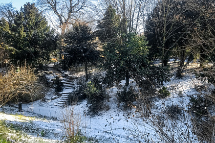 Buttes-Chaumont Park under the snow in winter, Paris, a Nature Photo by GoodGoods