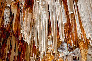 White stalactites and stalagmites in, a Nature Photo by Perpis