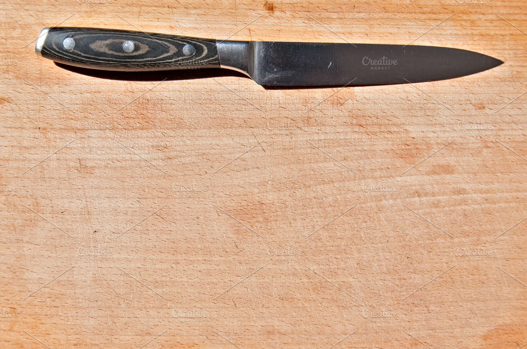 Knife On Cutting Board