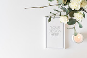 Notepad mockup with candle., an iPhone Mockup by Una Matison (Thumbnail 1 of 2)
