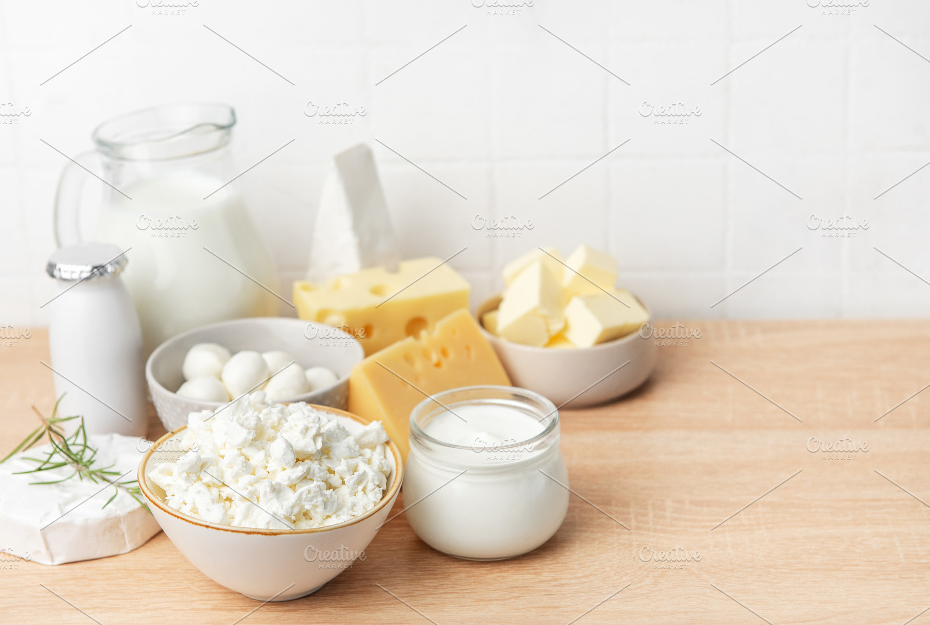 Dairy products assortment including milk, cheese, butter, yogurt, a Food & Drink Photo by Olena Rudo